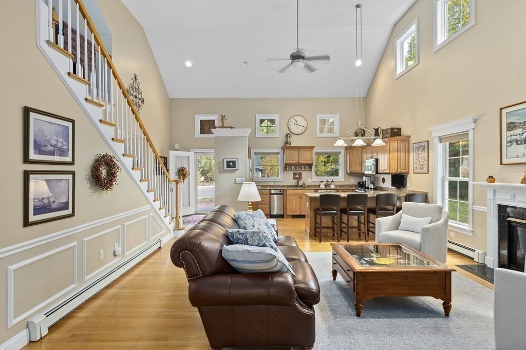 17 Summersweet Circle, Unit 22 Hanover, MA 02339 - Photo 21 of 42 a living room with furniture kitchen view and a large window