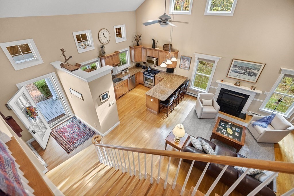 17 Summersweet Circle, Unit 22 Hanover, MA 02339 - Photo 31 of 42 a living room with furniture and a flat screen tv