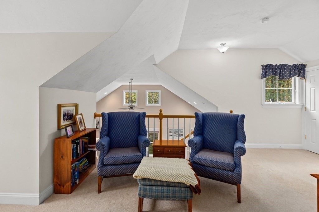 17 Summersweet Circle, Unit 22 Hanover, MA 02339 - Photo 33 of 42 a living room with furniture and a window