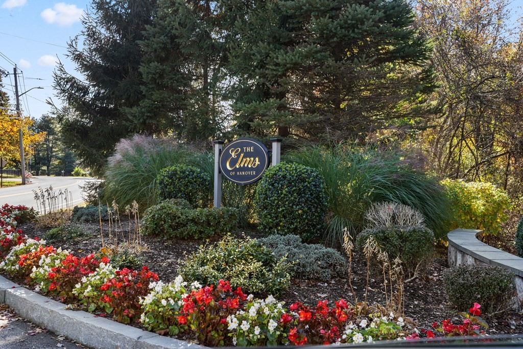 17 Summersweet Circle, Unit 22 Hanover, MA 02339 - Photo 41 of 42 a view of sign board with plants and trees