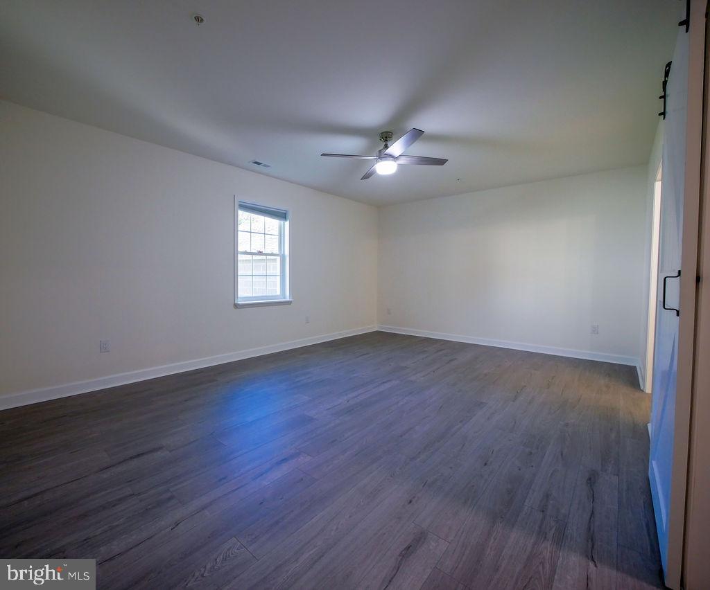 207 West 4th Street Ridgely, MD 21660 - Photo 26 of 50 Owner's bedroom with ceiling fan