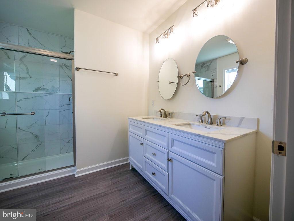 207 West 4th Street Ridgely, MD 21660 - Photo 29 of 50 Owner's bath with double vanity