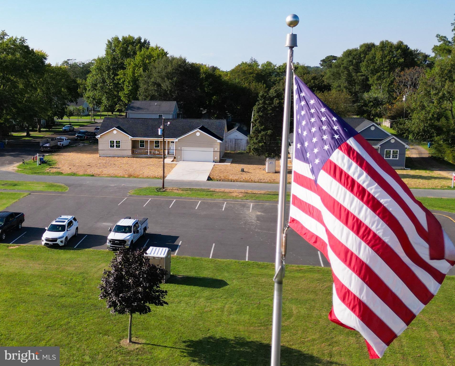 207 West 4th Street Ridgely, MD 21660 - Photo 41 of 50 View of home in background with American flag