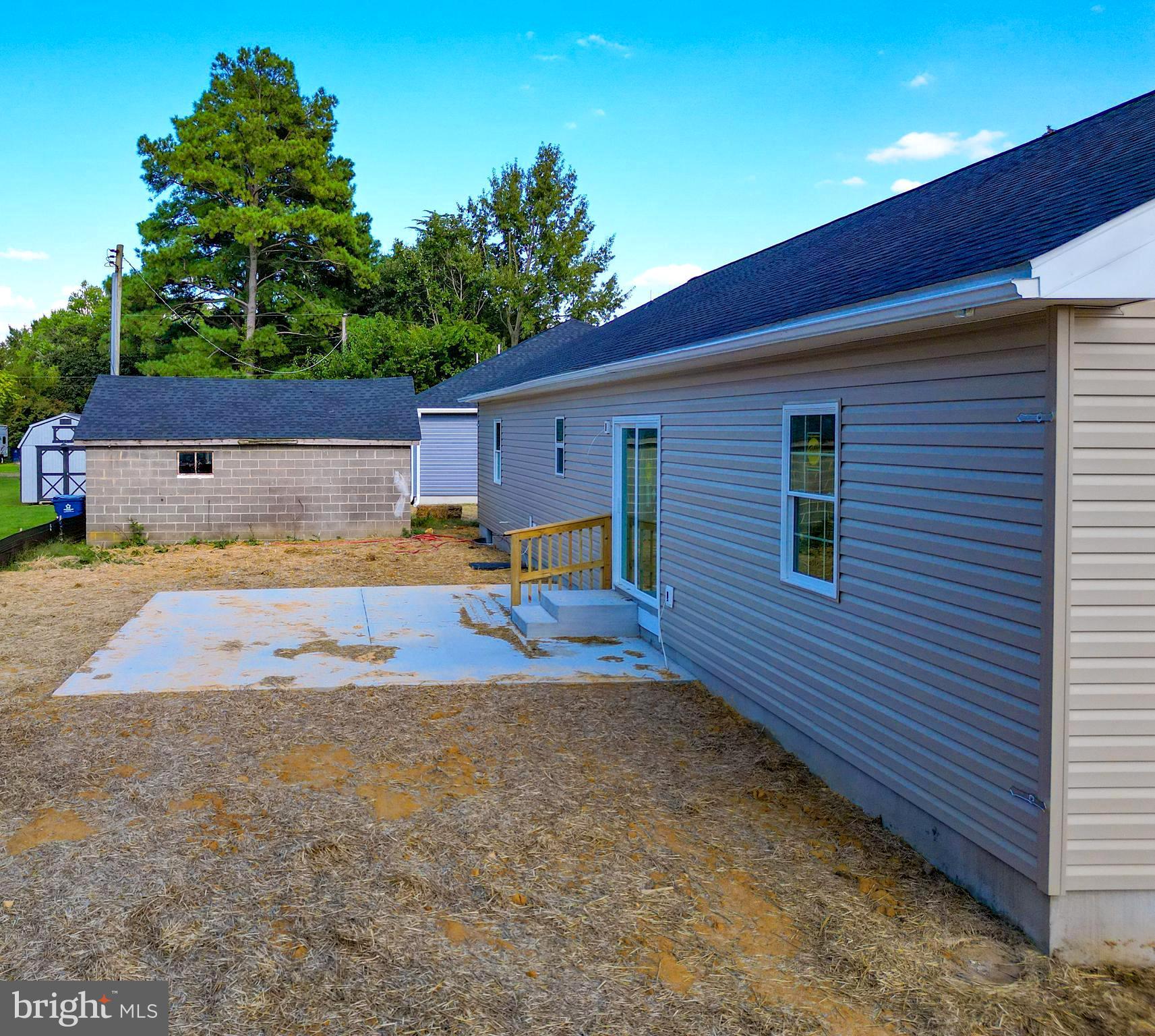207 West 4th Street Ridgely, MD 21660 - Photo 5 of 50 Back view of the patio and shed to be rehabbed