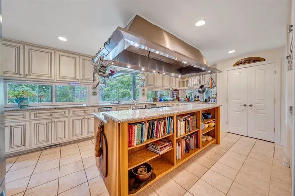 a bathroom with bathtub and a shower