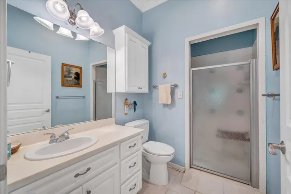 a view of a house with yard and sitting area