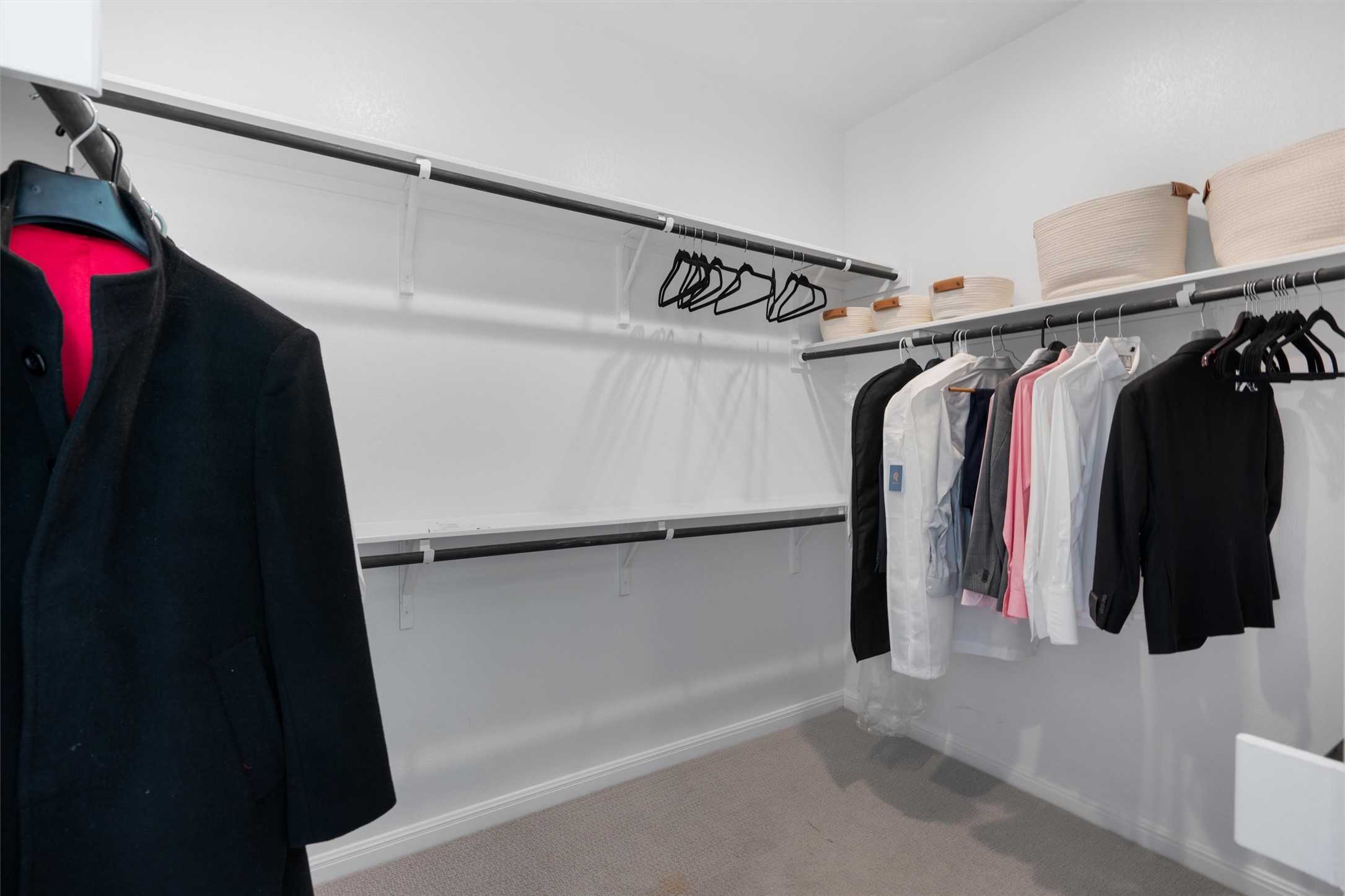 1908 Cabrera Drive Leander, TX 78641 - Photo 20 of 37 a view of walk in closet with clothes and shoes