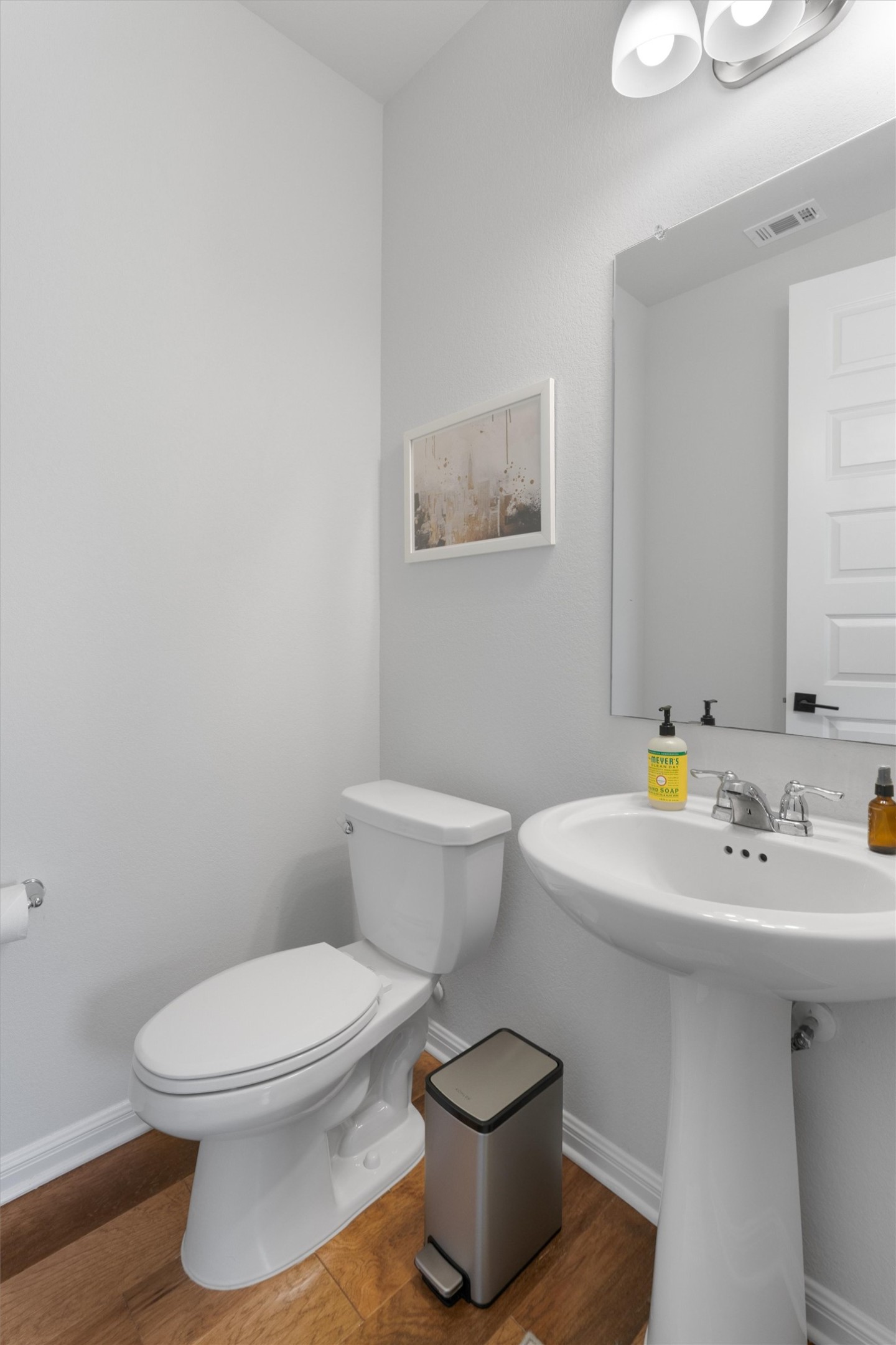 1908 Cabrera Drive Leander, TX 78641 - Photo 22 of 37 a bathroom with a toilet a sink and mirror
