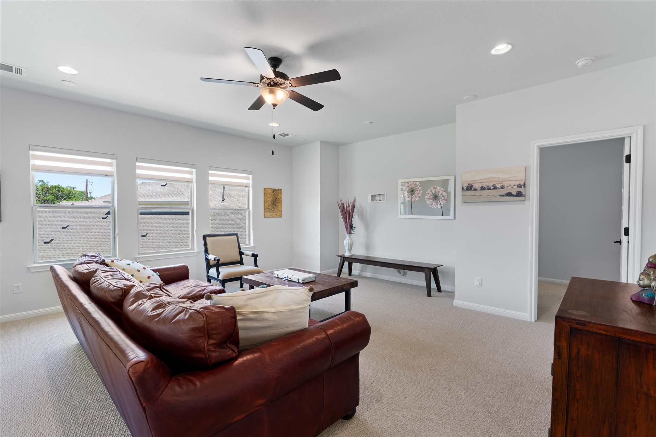 1908 Cabrera Drive Leander, TX 78641 - Photo 23 of 37 a living room with furniture and a ceiling fan
