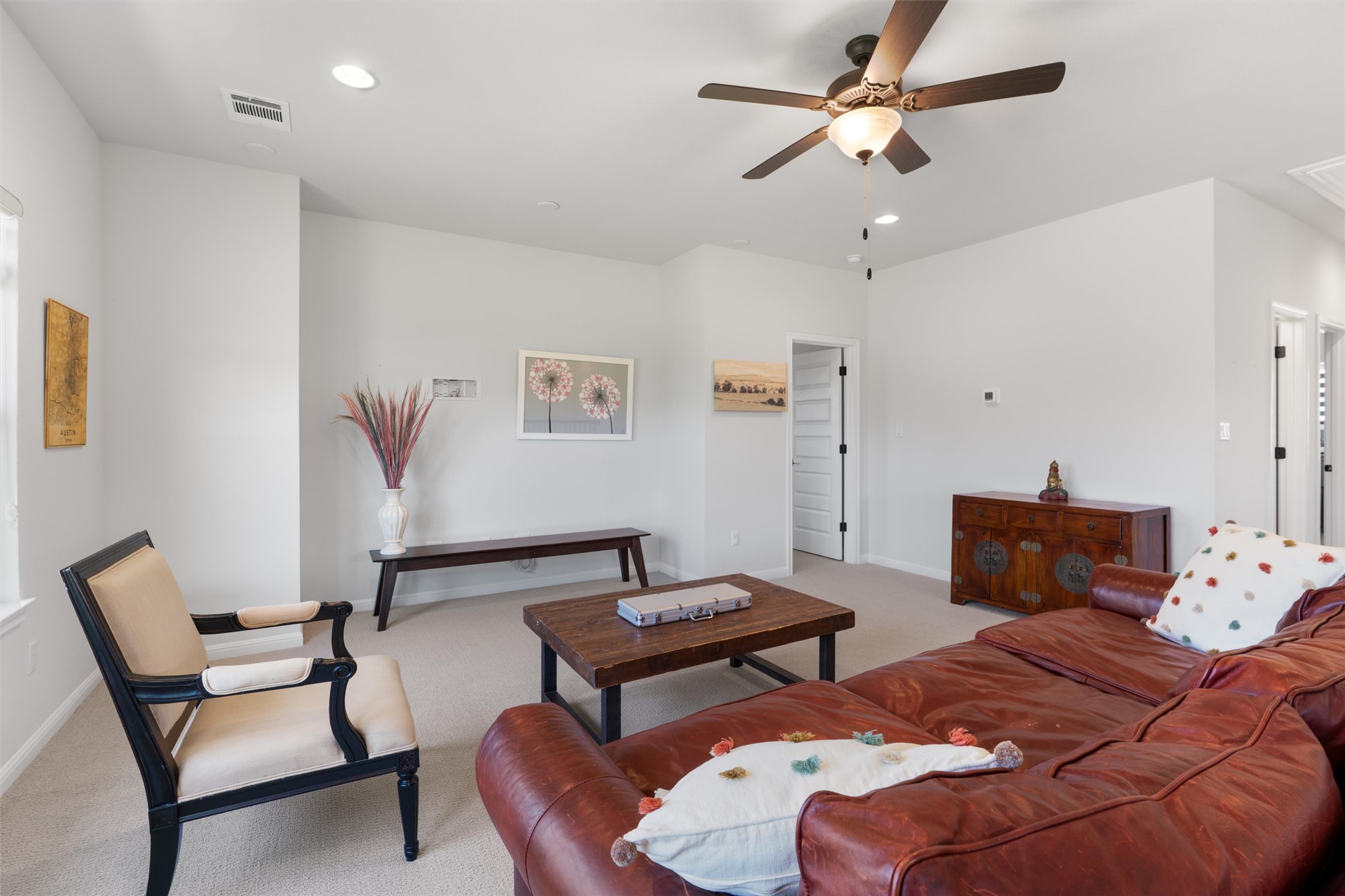 1908 Cabrera Drive Leander, TX 78641 - Photo 24 of 37 a bedroom with a bed and a chair