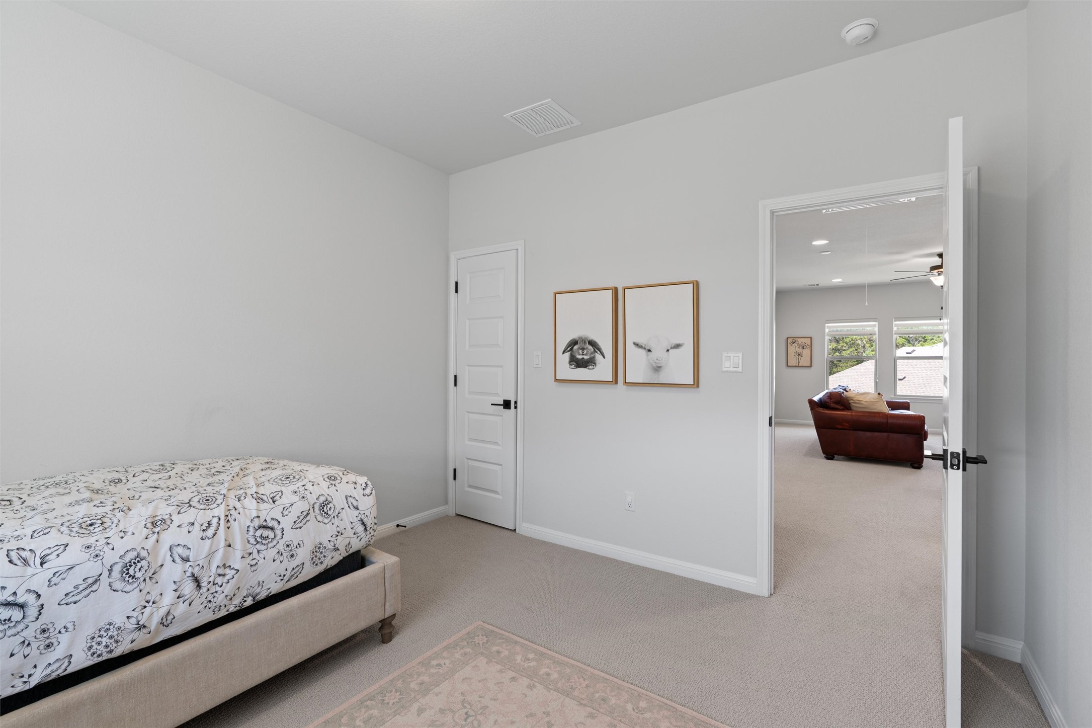 1908 Cabrera Drive Leander, TX 78641 - Photo 31 of 37 a bedroom with a bed and a couch