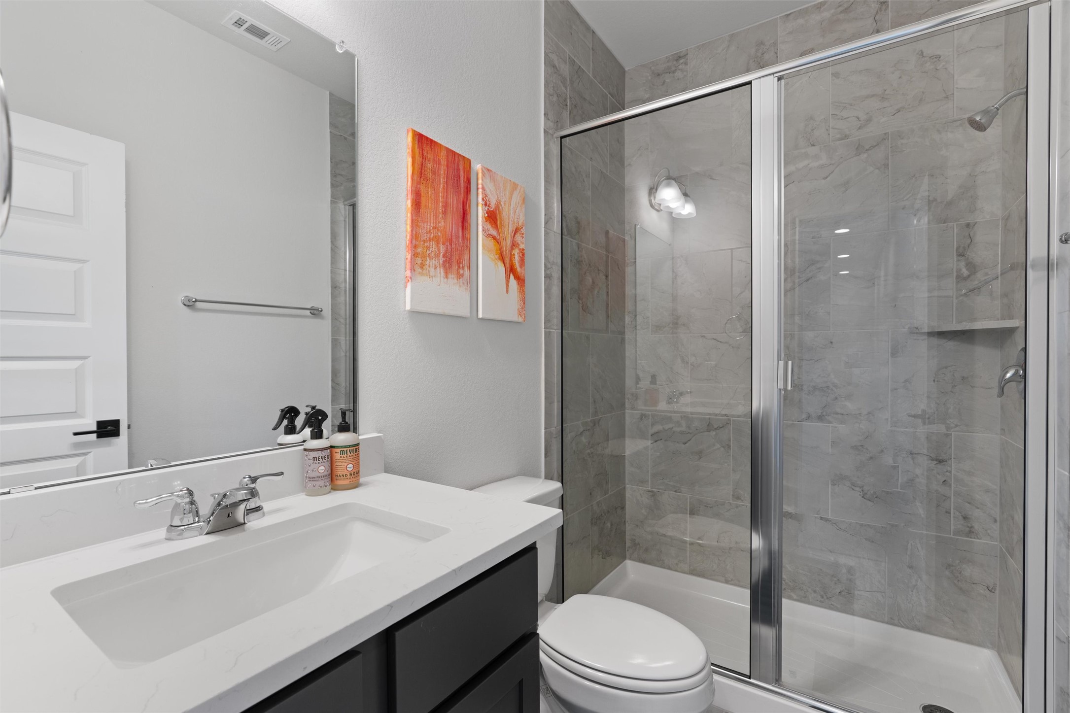 1908 Cabrera Drive Leander, TX 78641 - Photo 32 of 37 a bathroom with a sink toilet and shower