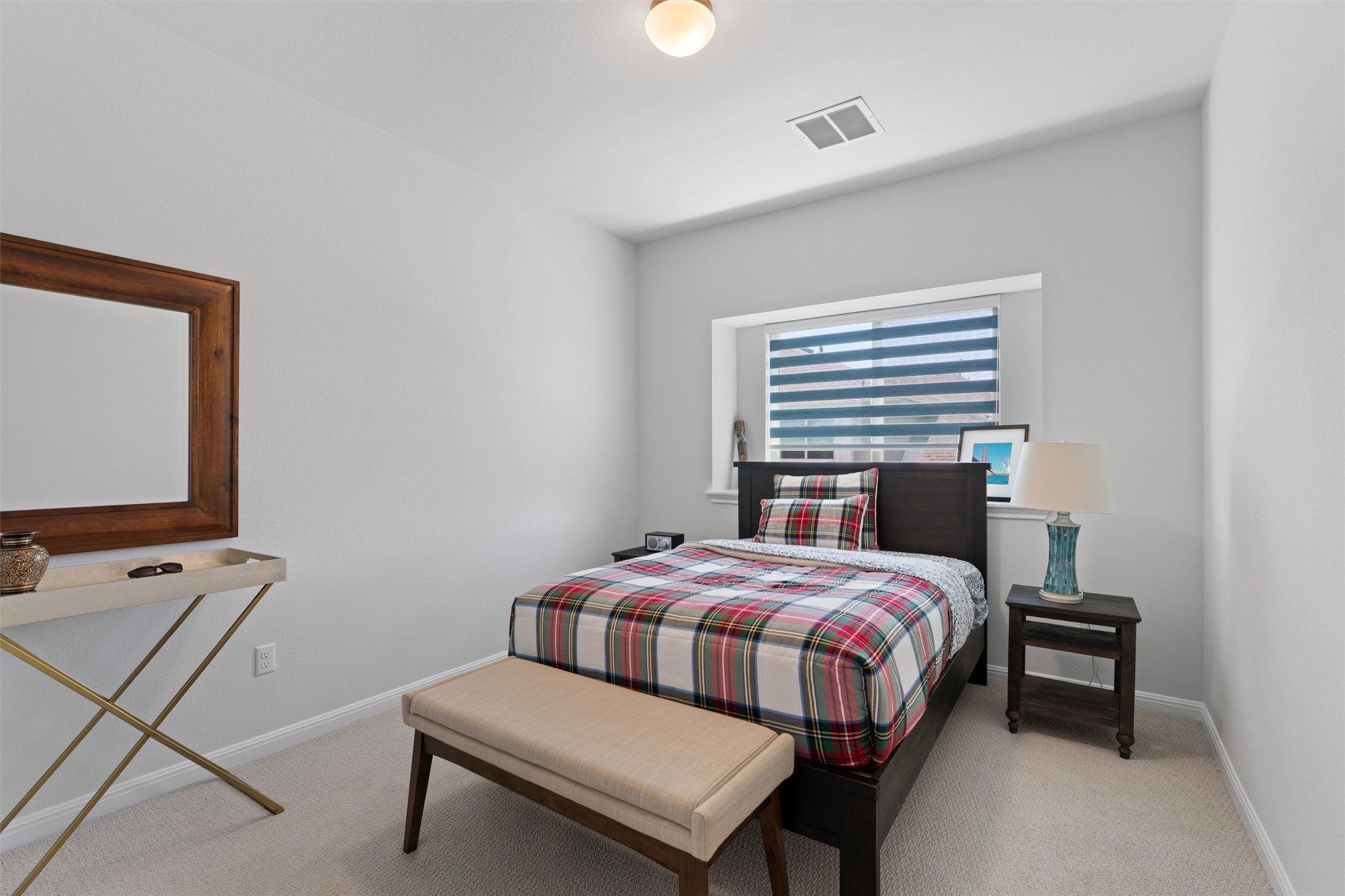 1908 Cabrera Drive Leander, TX 78641 - Photo 33 of 37 a bedroom with a bed and a desk