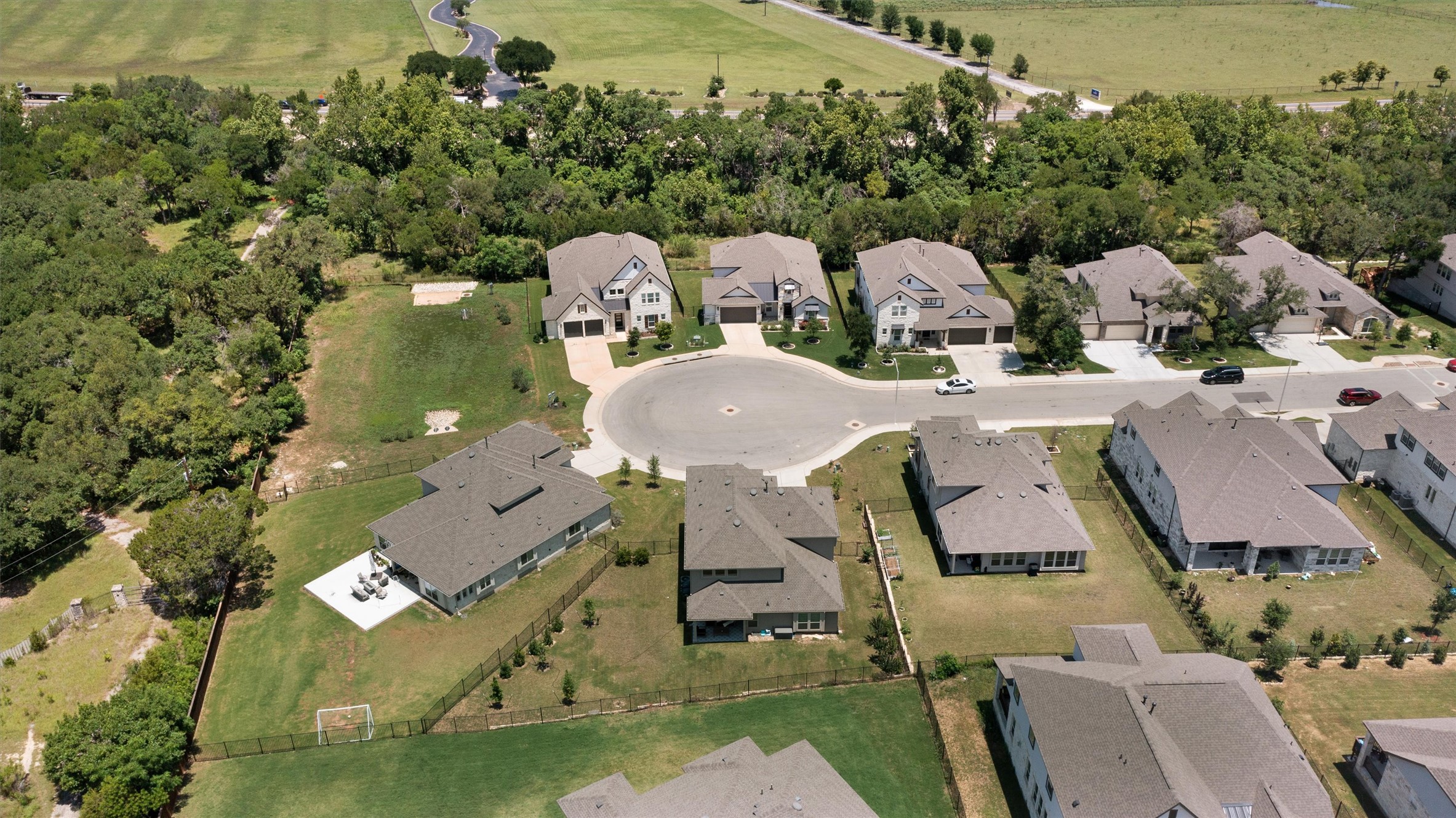 1908 Cabrera Drive Leander, TX 78641 - Photo 36 of 37 an aerial view of a house with swimming pool and lake view