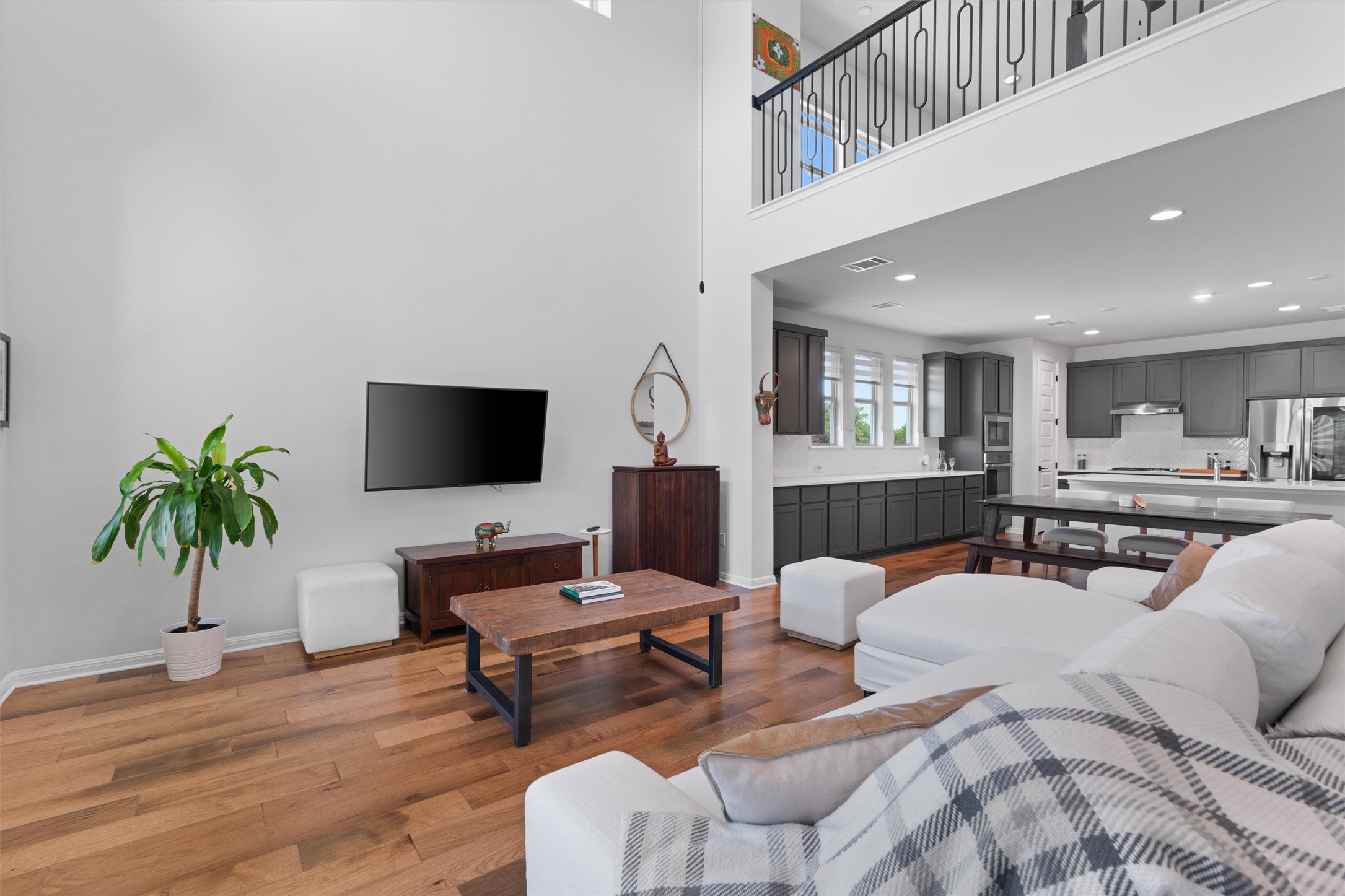 1908 Cabrera Drive Leander, TX 78641 - Photo 6 of 37 a living room with furniture and a flat screen tv