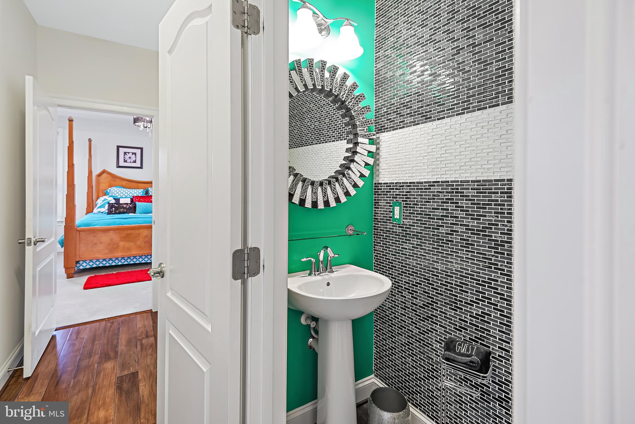 13003 Contee Manor Road Bowie, MD 20721 - Photo 41 of 93 Hall View to Powder Room