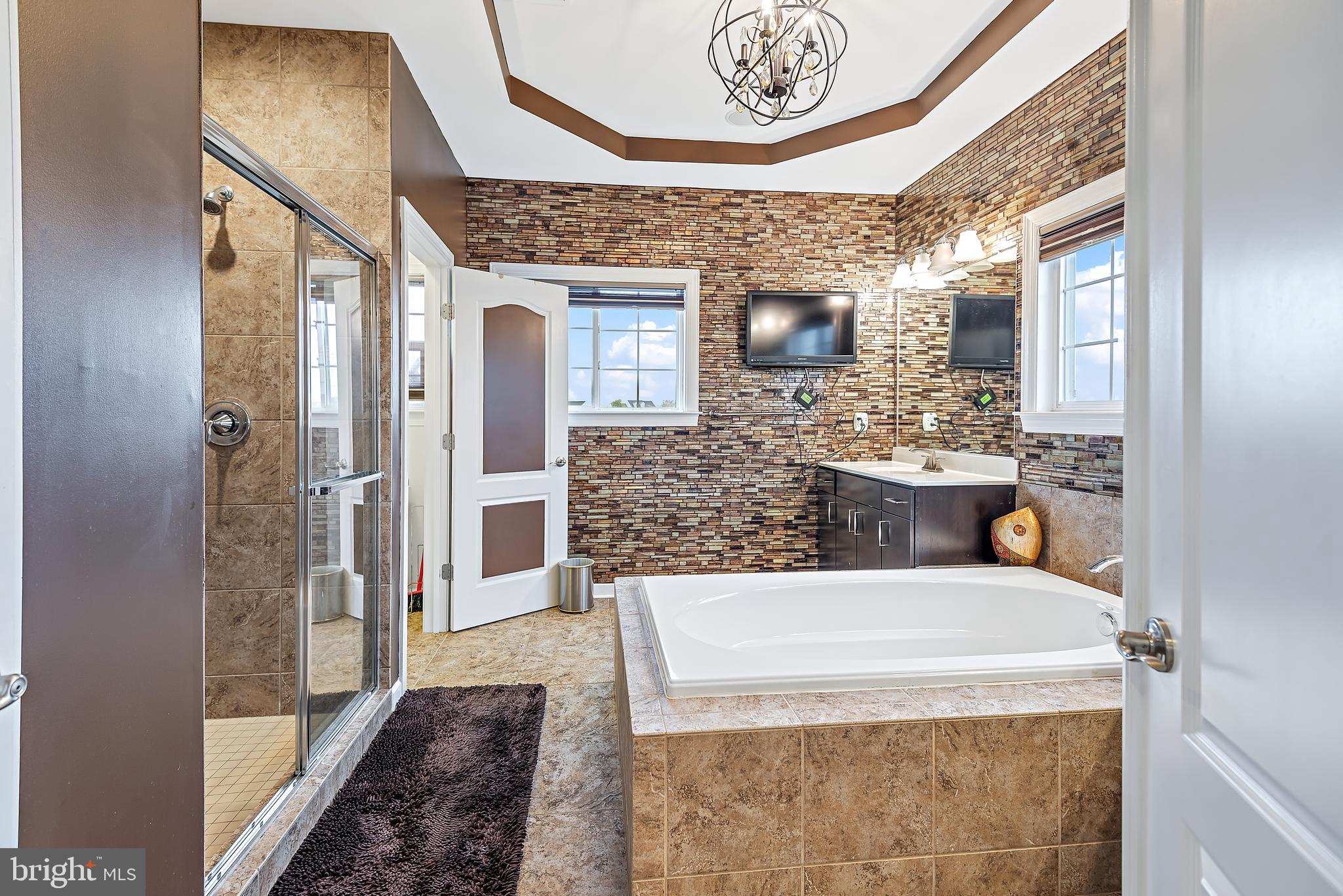 13003 Contee Manor Road Bowie, MD 20721 - Photo 71 of 93 Owner's Spa w/ Soaking Tub & Seated Shower