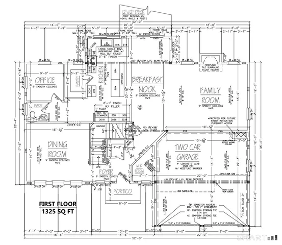 a white house with a street sign on it