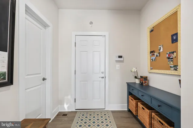 a bathroom with a sink a mirror and a shower