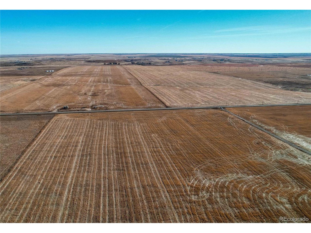 Manila Road Bennett, CO 80102 - Photo 19 of 24 a view of a room with wooden floor