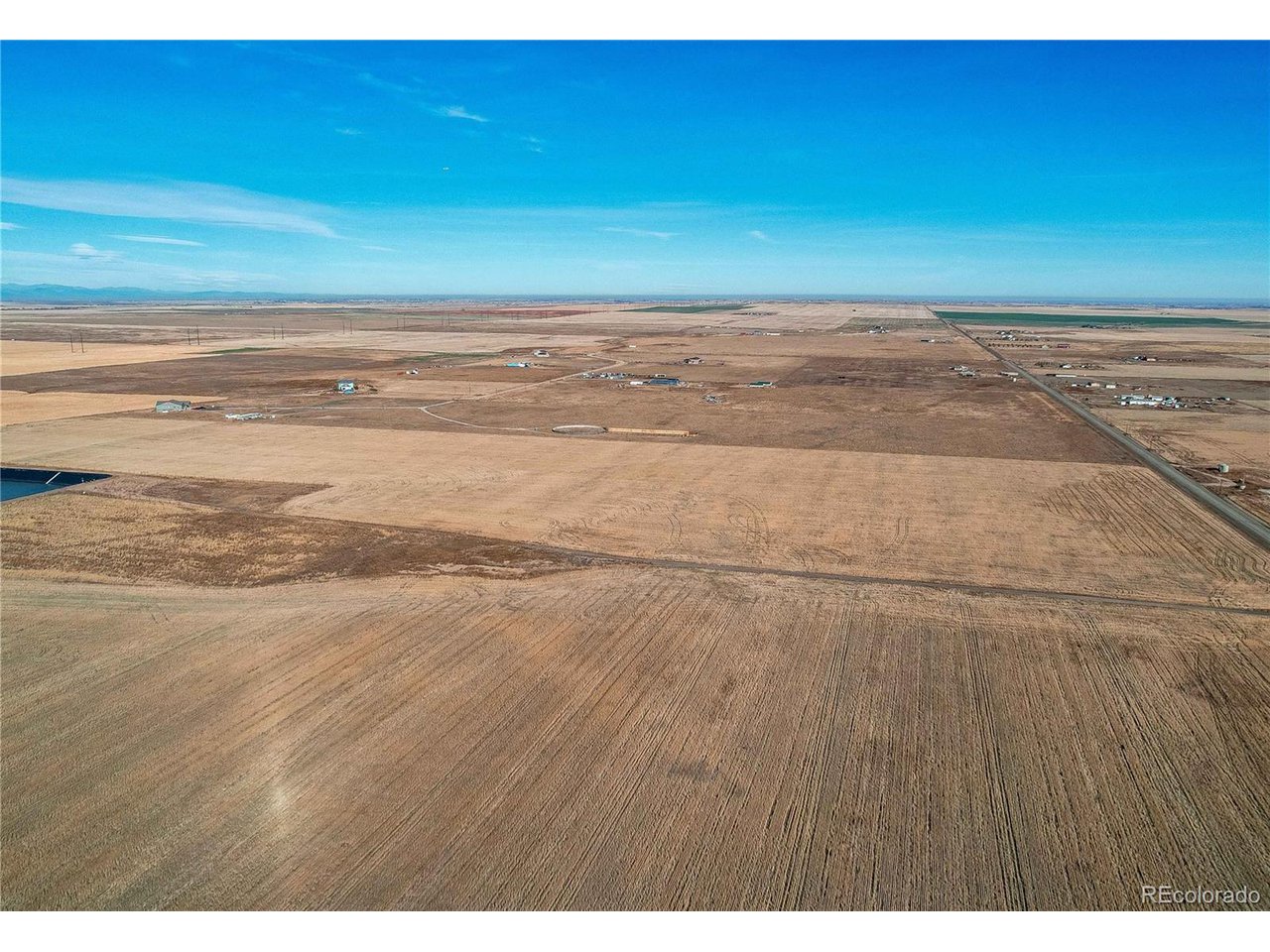 Manila Road Bennett, CO 80102 - Photo 23 of 24 a view of an ocean and beach