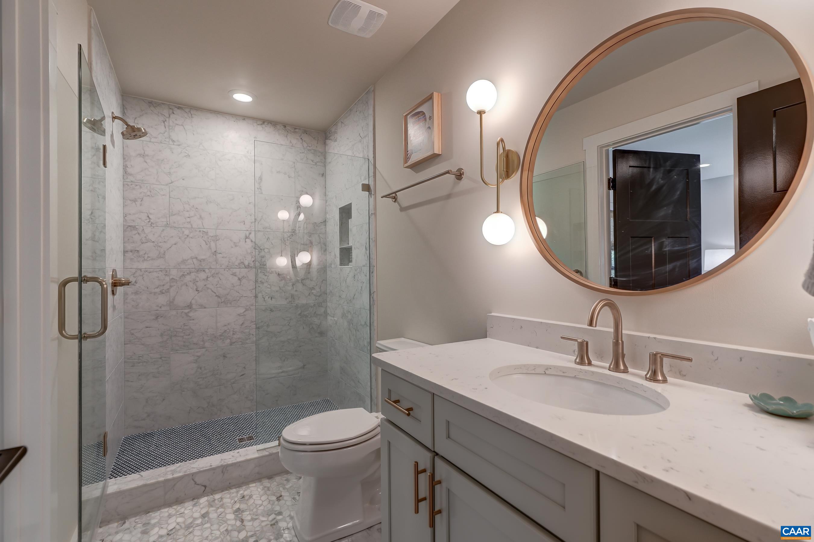 3327 Rowcross Street Crozet, VA 22932 - Photo 41 of 63 Full hall bathroom with frameless glass shower.