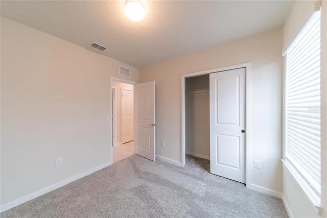 a view of a storage & utility room with a sink