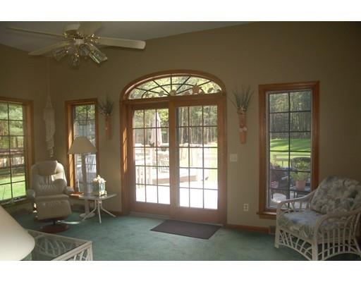 255 N Road Westfield, MA 01085 - Photo 14 of 30 a living room with furniture and a floor to ceiling window