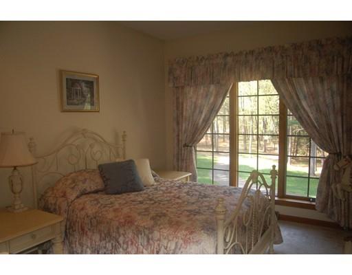 255 N Road Westfield, MA 01085 - Photo 20 of 30 a bedroom with a bed and a large window