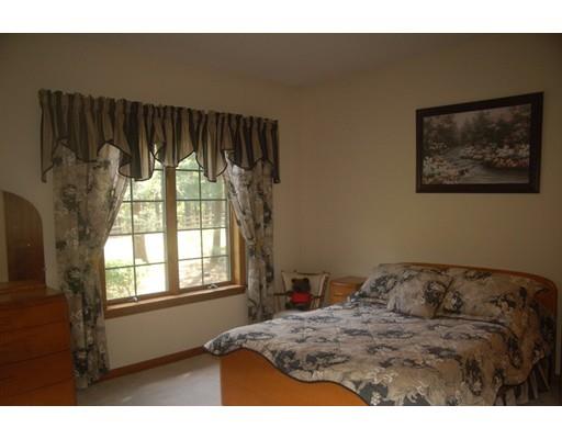 255 N Road Westfield, MA 01085 - Photo 21 of 30 a bedroom with a bed and a painting on the wall
