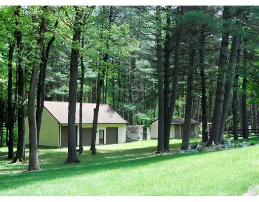 255 N Road Westfield, MA 01085 - Photo 26 of 30 a view of a house next to a big yard and large trees