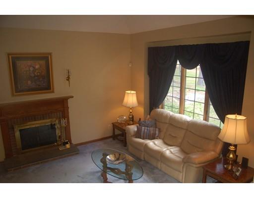 255 N Road Westfield, MA 01085 - Photo 6 of 30 a living room with furniture and a fireplace