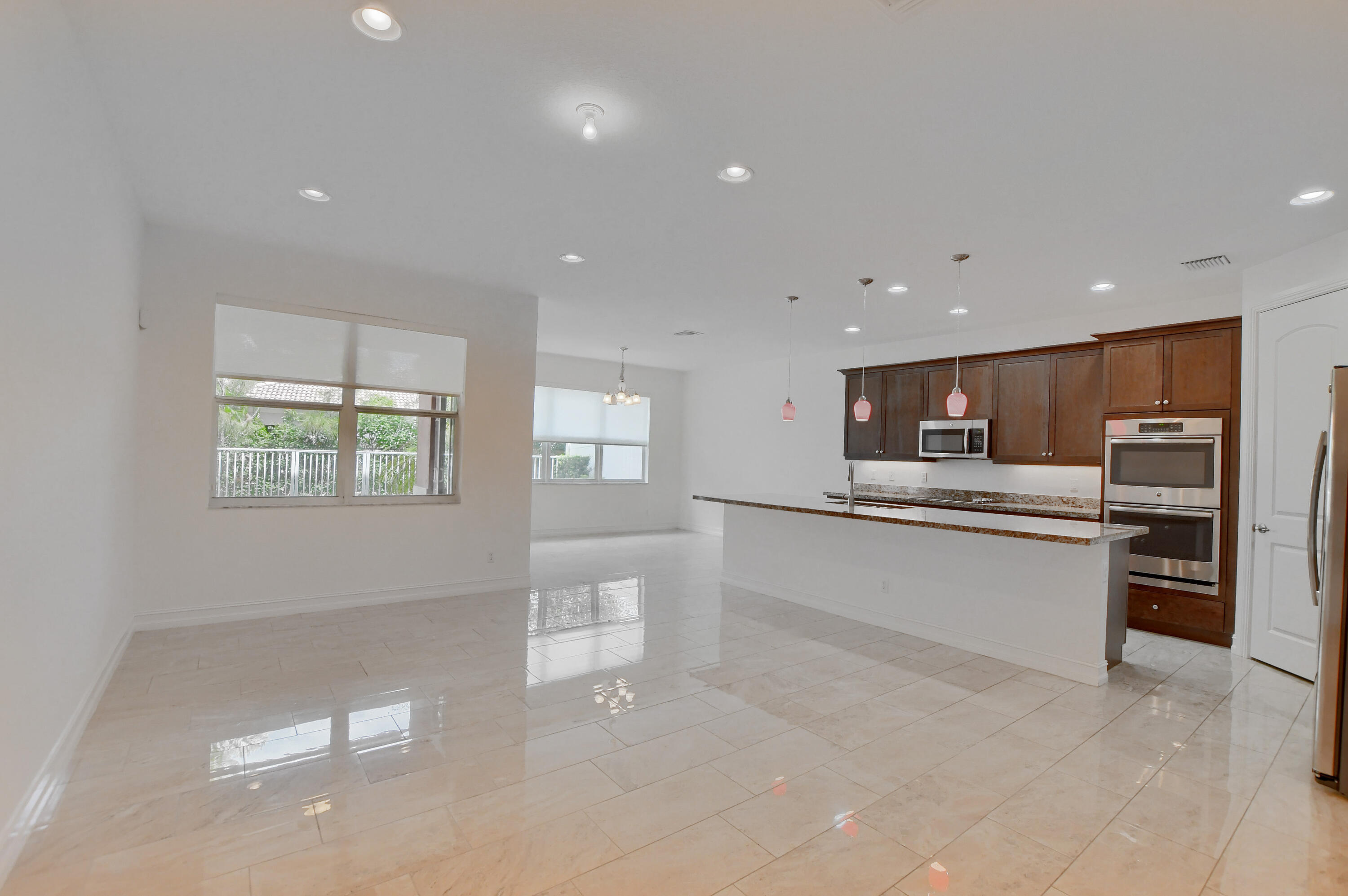 100 Northwest 69th Circle, Unit 15 Boca Raton, FL 33487 - Photo 5 of 45 Living/Kitchen