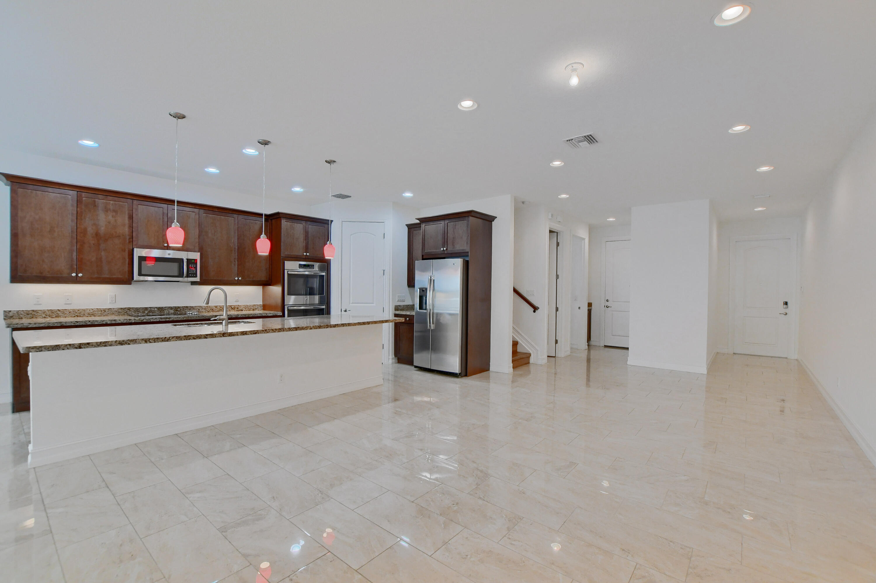 100 Northwest 69th Circle, Unit 15 Boca Raton, FL 33487 - Photo 6 of 45 Living/Kitchen