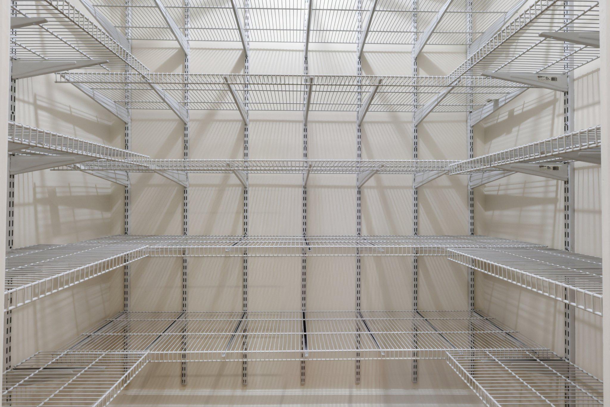 1101 St Paul Street, Unit 1212 Baltimore, MD 21202 - Photo 35 of 36 Large pantry/closet with organized shelving.
