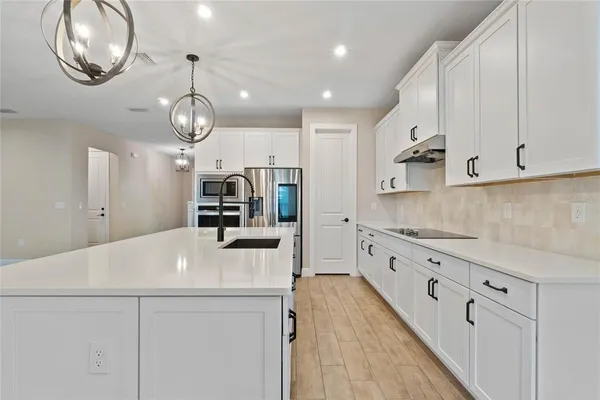 an open kitchen with cabinets