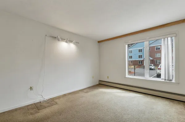 $294,500 | 3 Timberwood Drive, Unit 106, Goffstown, NH 03045