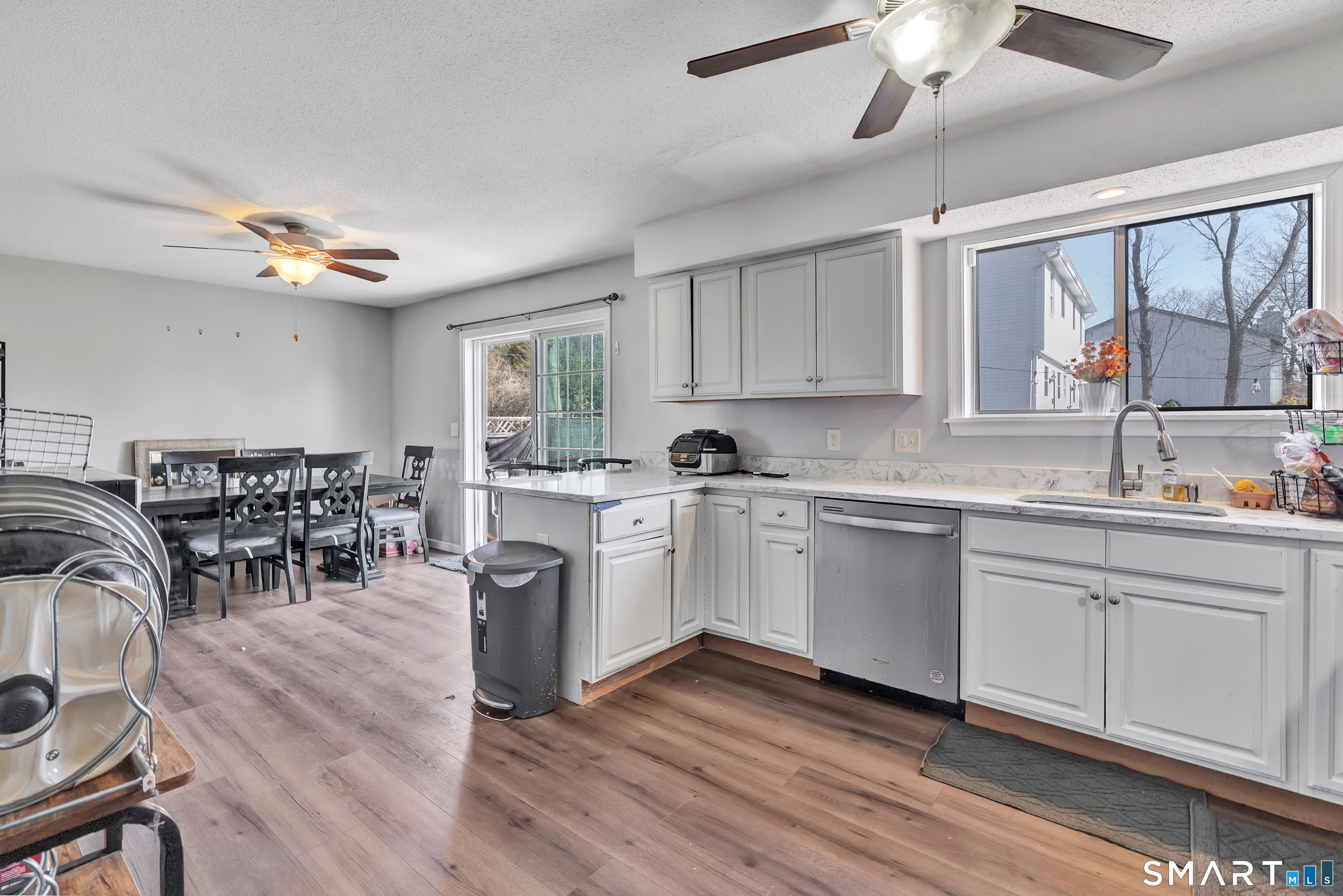 71 Cliff Street Naugatuck, CT 06770 - Photo 14 of 40 a kitchen with sink cabinets and window