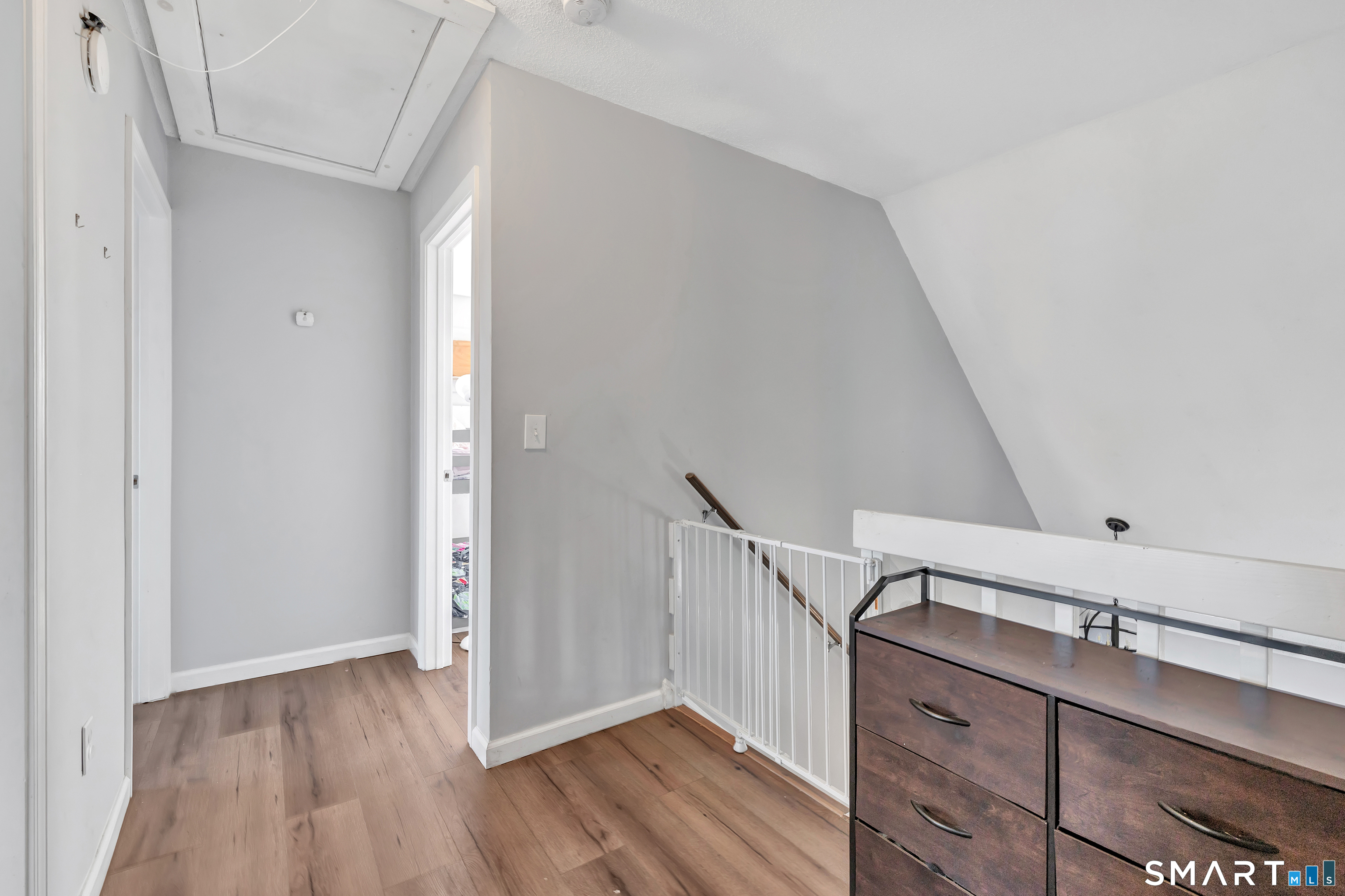 71 Cliff Street Naugatuck, CT 06770 - Photo 19 of 40 a view of a hallway with wooden floor