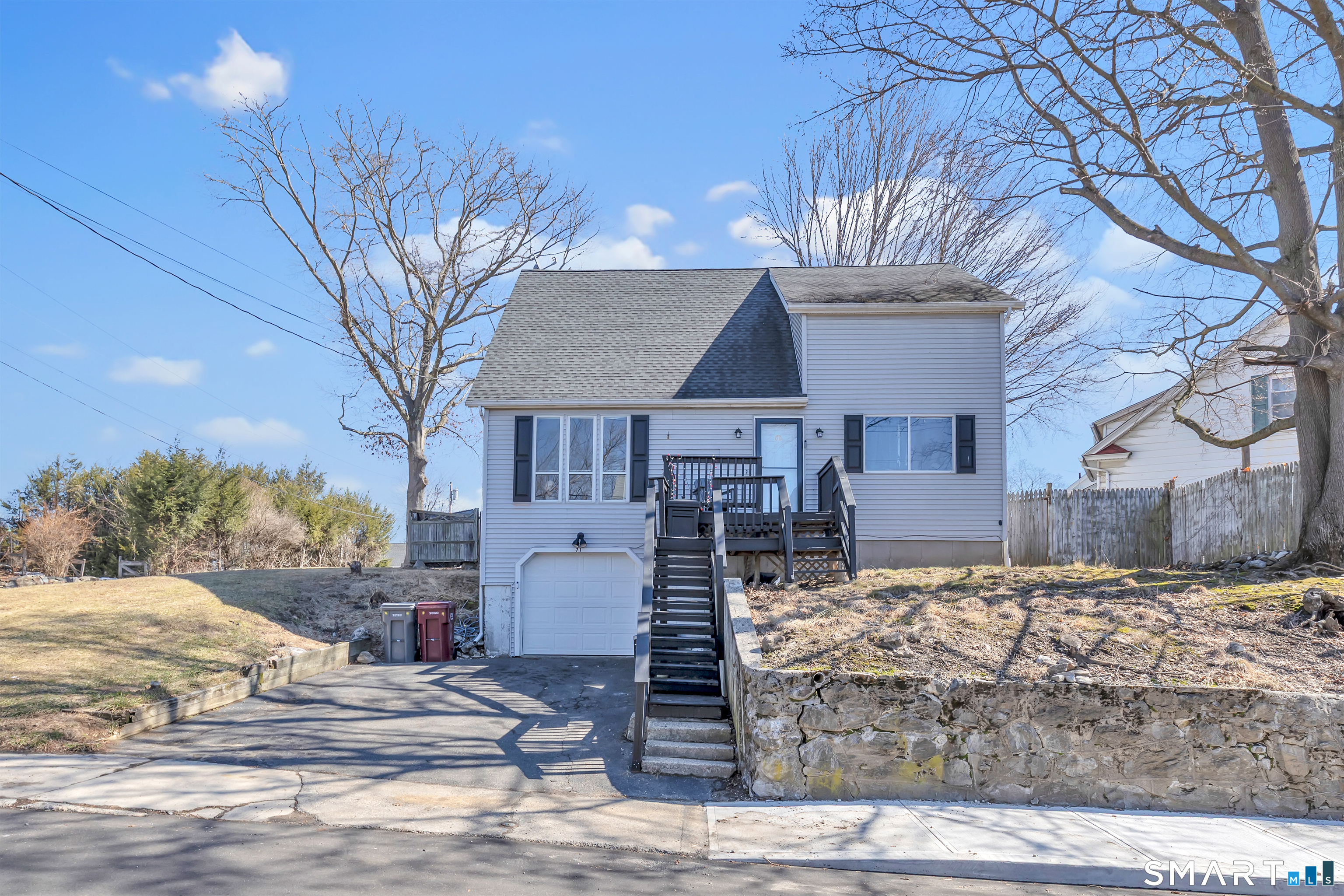 71 Cliff Street Naugatuck, CT 06770 - Photo 2 of 40 a front view of a house with garden