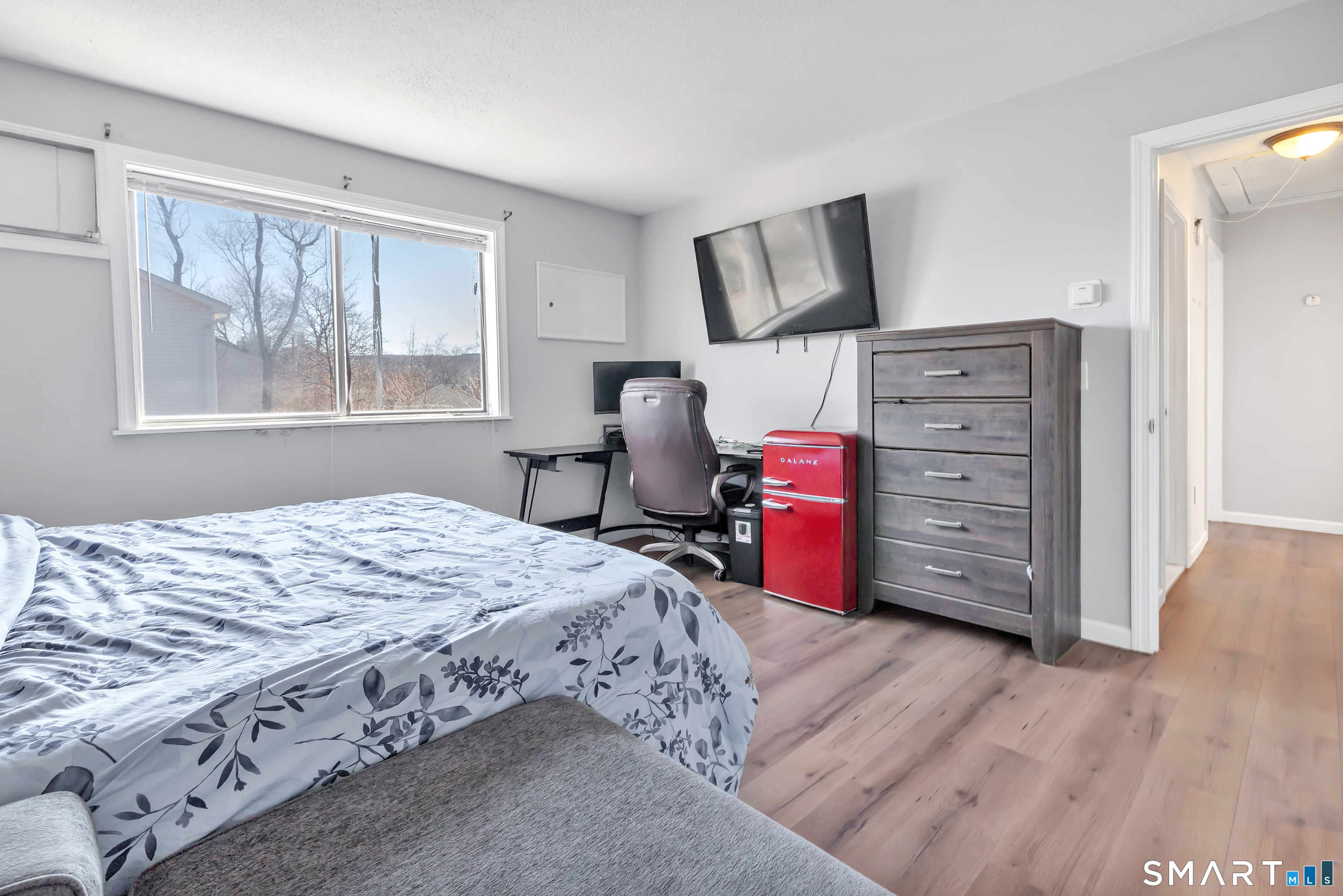 71 Cliff Street Naugatuck, CT 06770 - Photo 22 of 40 a bedroom with a bed closet and a window