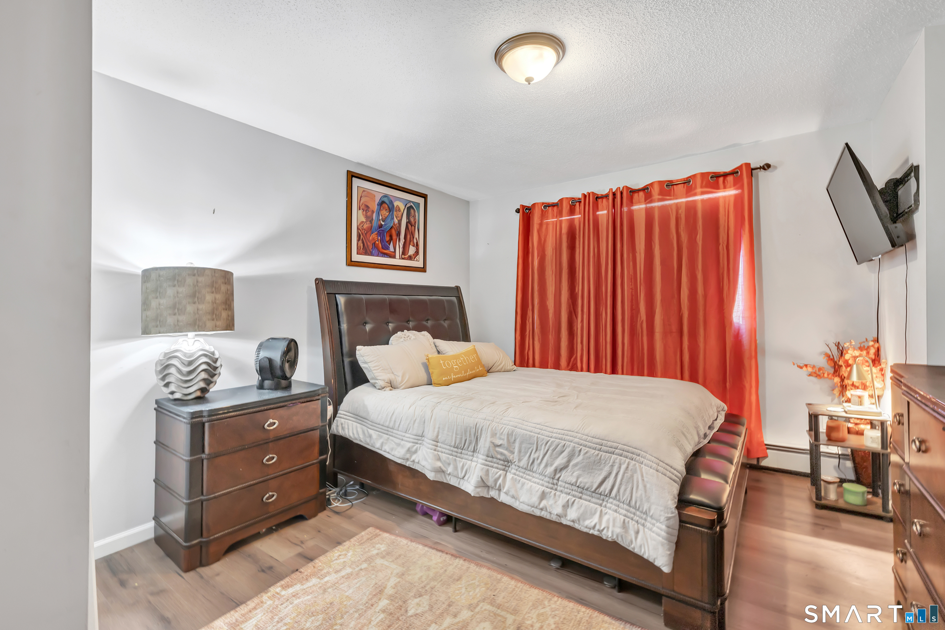 71 Cliff Street Naugatuck, CT 06770 - Photo 31 of 40 a bedroom with a bed and furniture