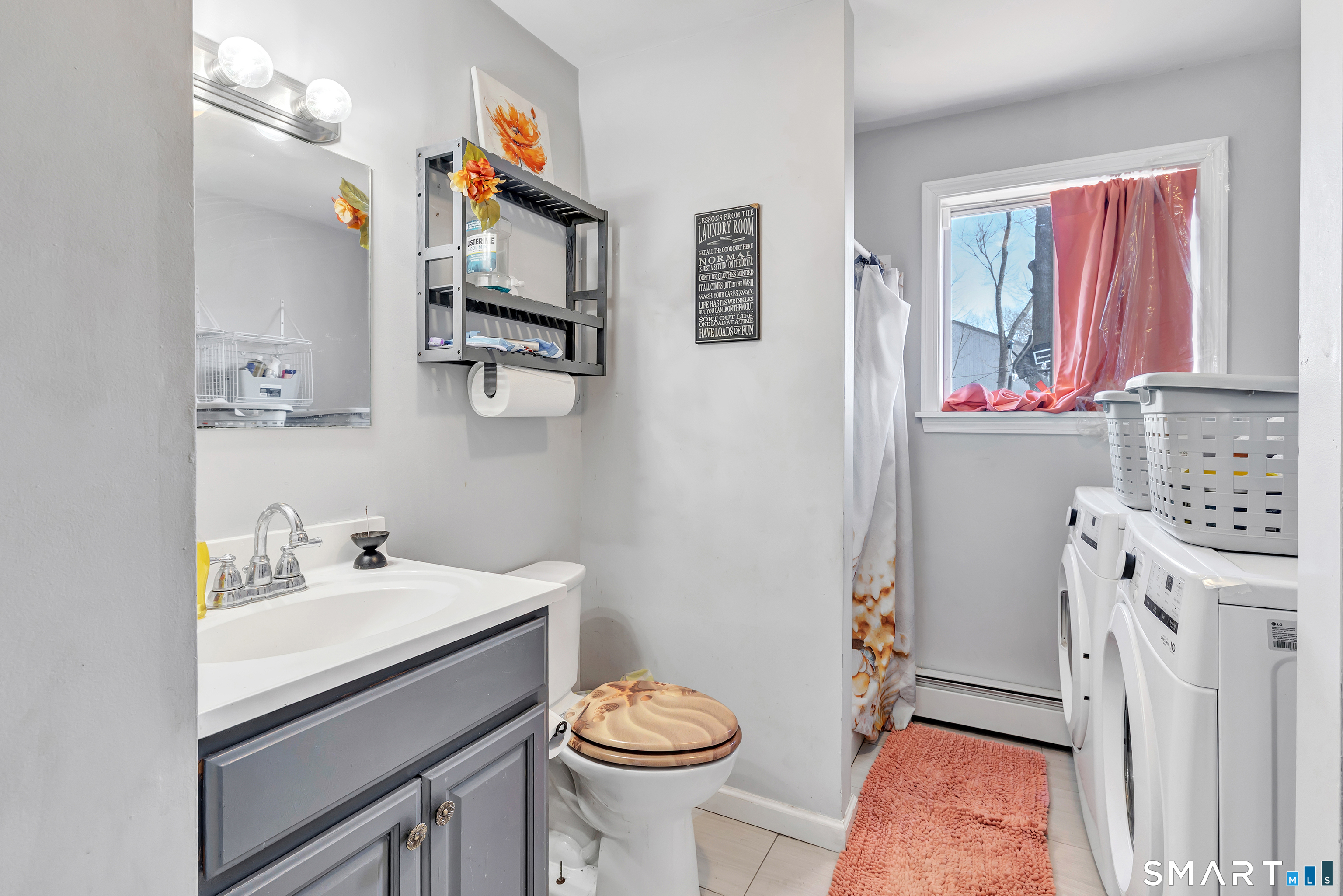 71 Cliff Street Naugatuck, CT 06770 - Photo 34 of 40 a bathroom with a sink vanity mirror and toilet