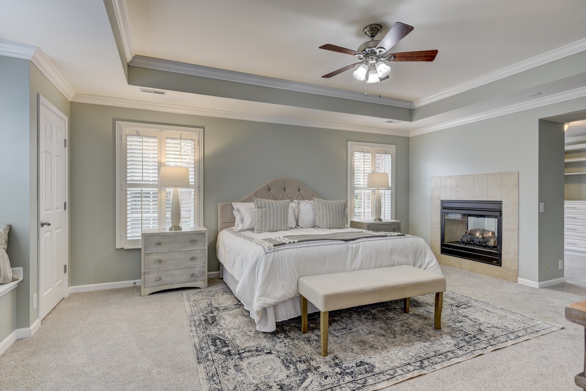 3008 Westerly Drive Franklin, TN 37067 - Photo 12 of 33 a bedroom with a bed and a chandelier