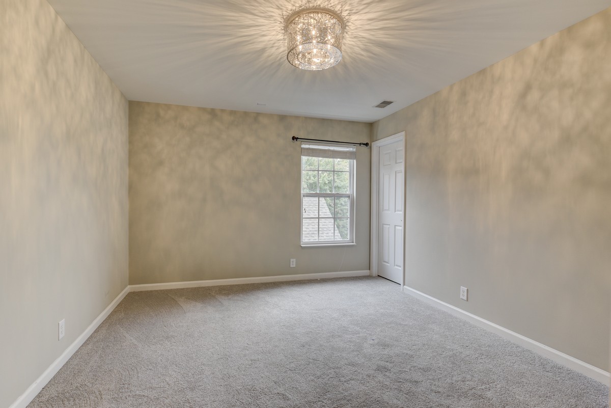 3008 Westerly Drive Franklin, TN 37067 - Photo 18 of 33 wooden floor in an empty room with a window
