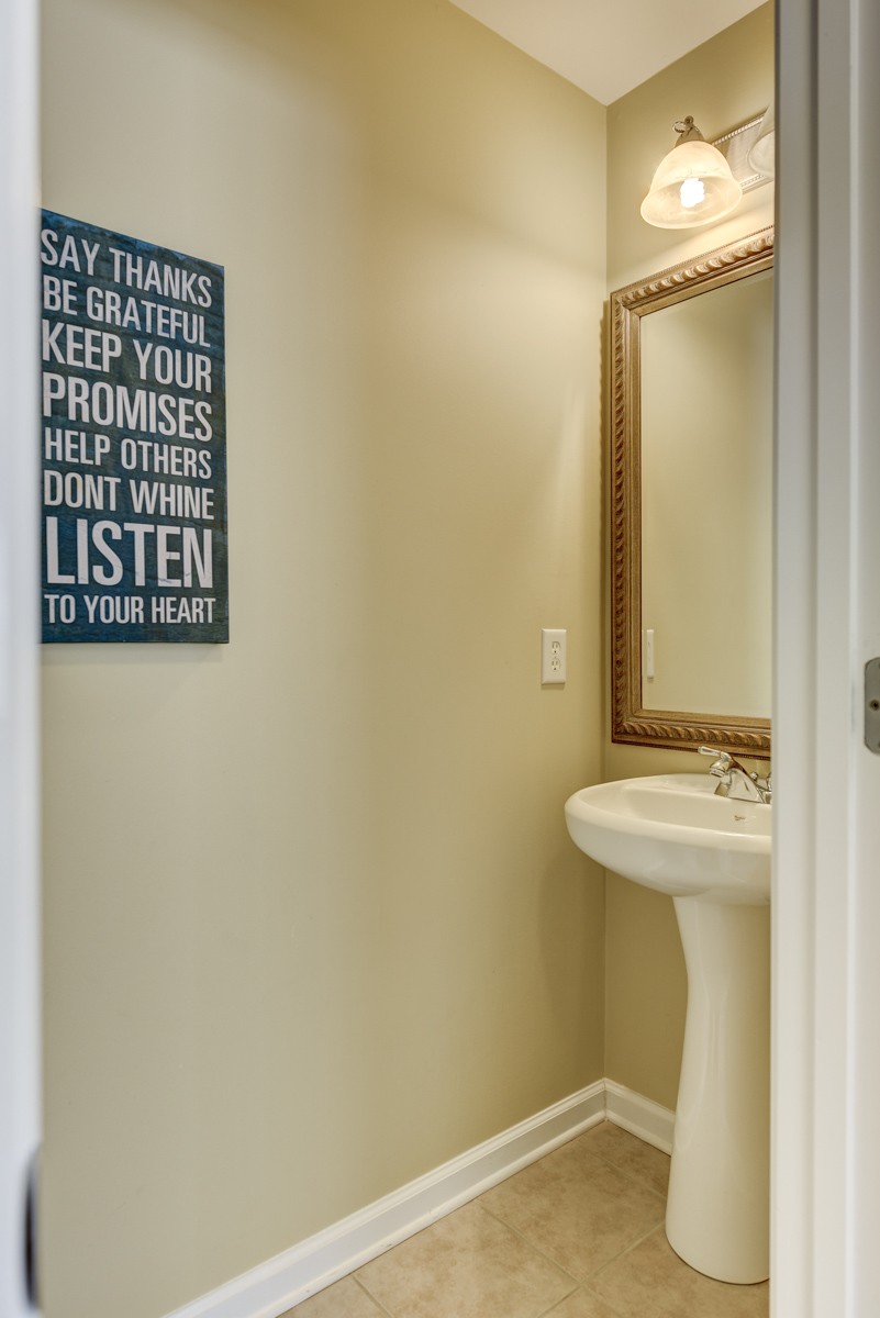 3008 Westerly Drive Franklin, TN 37067 - Photo 21 of 33 a bathroom with a sink and mirror
