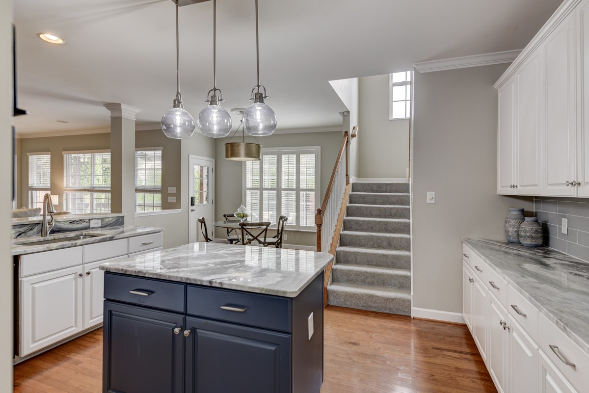 3008 Westerly Drive Franklin, TN 37067 - Photo 8 of 33 a bathroom with a granite countertop sink a mirror and a shower
