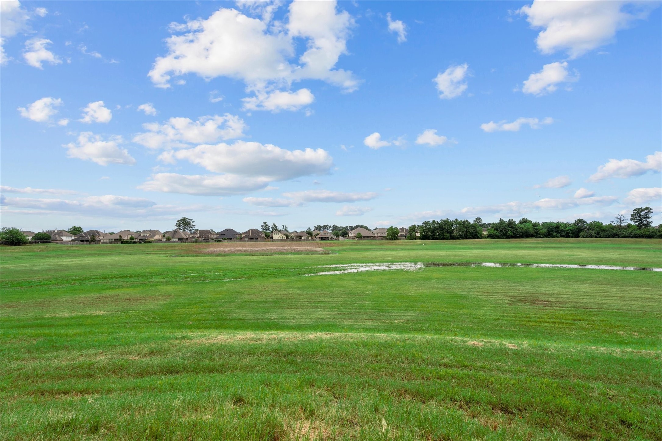 6323 Stone Trail Lane Spring, TX 77379 - Photo 32 of 43 a view of a green field with clear sky