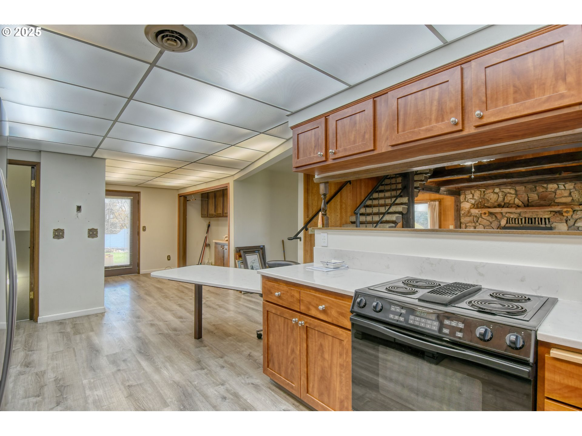 3540 Northeast King Place Pendleton, OR 97801 - Photo 17 of 48 a kitchen with a stove and a refrigerator