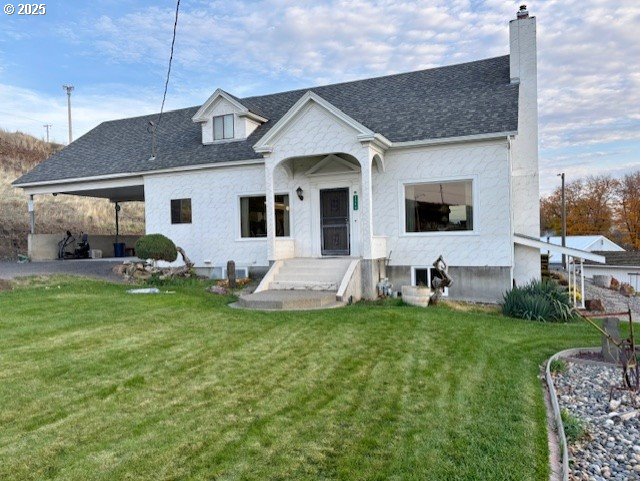 3540 Northeast King Place Pendleton, OR 97801 - Photo 2 of 48 a front view of a house with a garden and plants